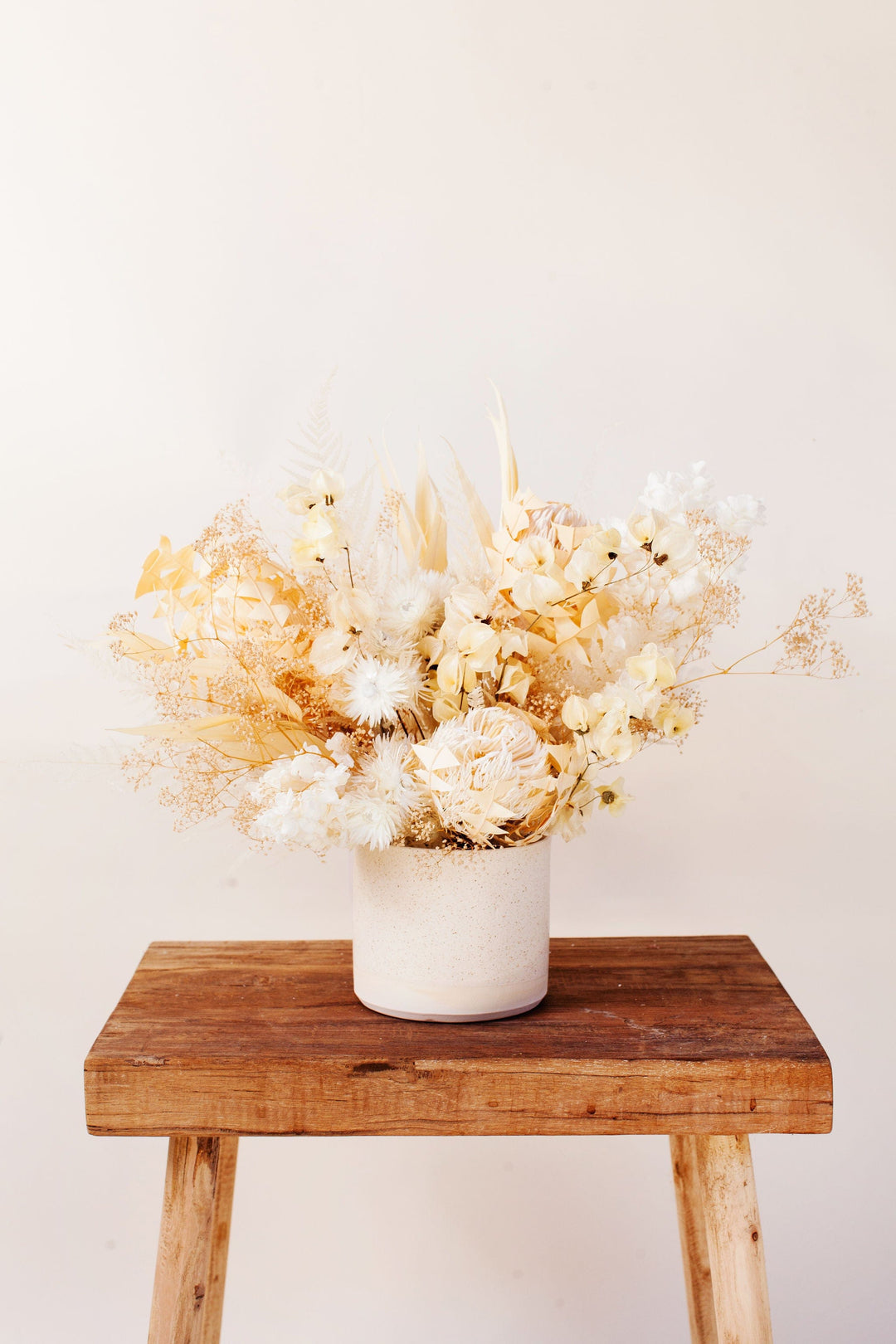 Idlewild Floral Co. Neutral Cream & Tan Centerpiece in Ceramic Vase
